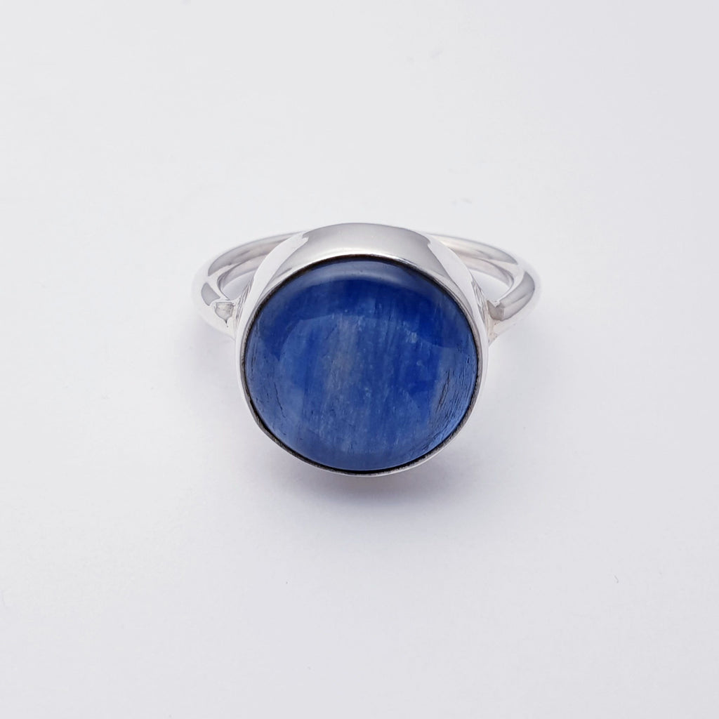 Our Kyanite Sterling Silver Round Ring is perfect for everyday wear or special occasions.  A beautiful simple design, this ring features a round cabochon, Kyanite stone in a simple setting on a sturdy band. This understated design will become your everyday favourite.