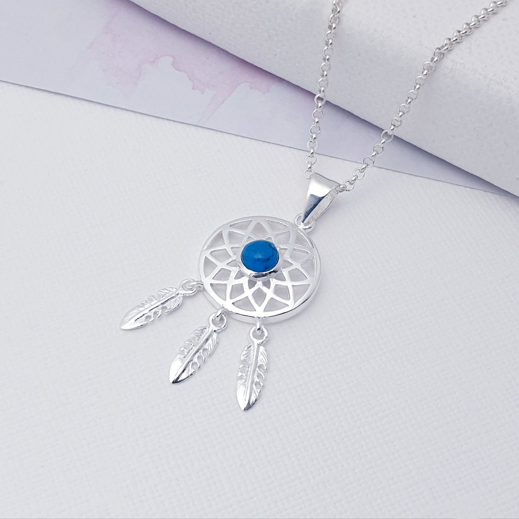 Our Turquoise Sterling Silver Dream Catcher Pendant (chain not included) is so cute as would be and perfect for everyday wear.  This stunning pendant features small, cabochon Turquoise' in the center of a beautifully detailed dream catcher, with three dangly feathers.