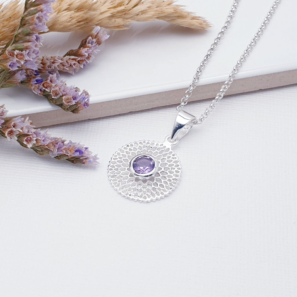 Our Amethyst Sterling Silver Chrysanthemum Pendant (chain not included) is so cute and would be perfect for everyday wear.  This stunning pendant features a small, cabochon Amethyst in the center of a beautifully detailed flower.