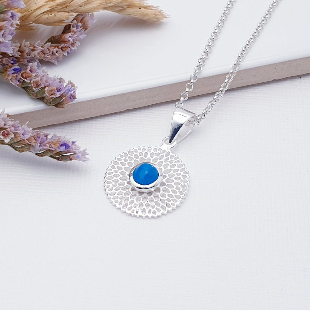 Our Turquoise Sterling Silver Chrysanthemum Pendant (chain not included) is so cute as would be and perfect for everyday wear.  This stunning pendant features a small, cabochon Turquoise' in the center of a beautifully detailed flower. 